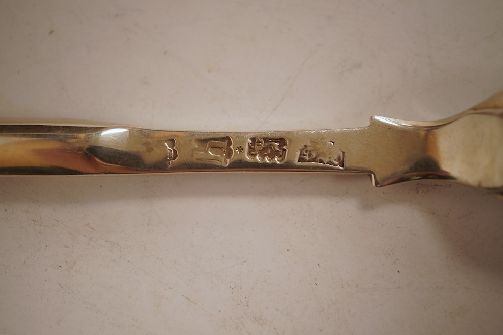 A George II silver marrow scoop, maker's mark rubbed, London, 1743, 21.3cm.